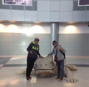 Marvin Sonsona, left, and Johnriel Casimero with Willyfrog on Friday at the McCarran International Airport in Las Vegas, Nevada. --AsianFightScene.com